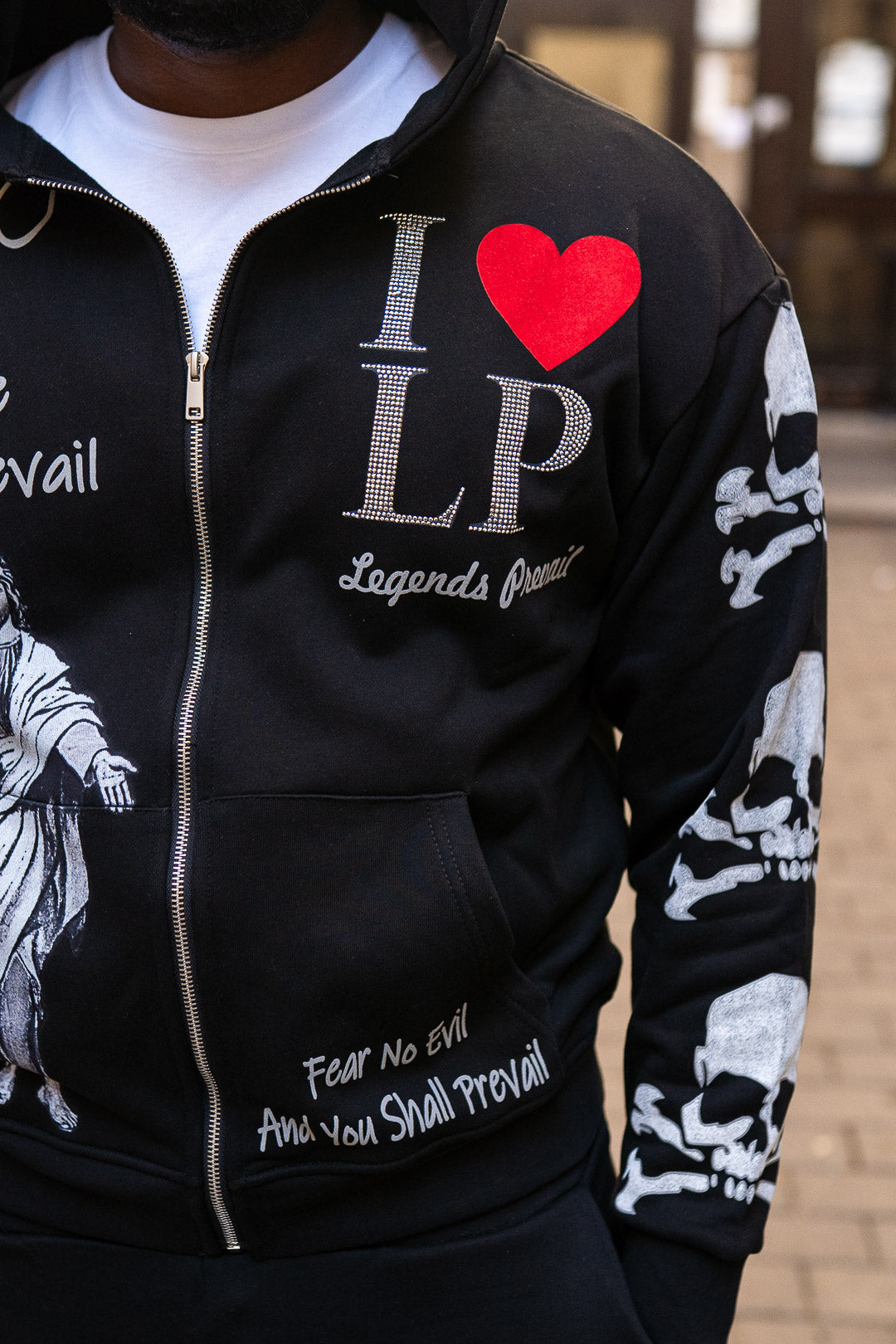 Black hoodie with 'I ❤️ LP' design and skull patterns on sleeves.